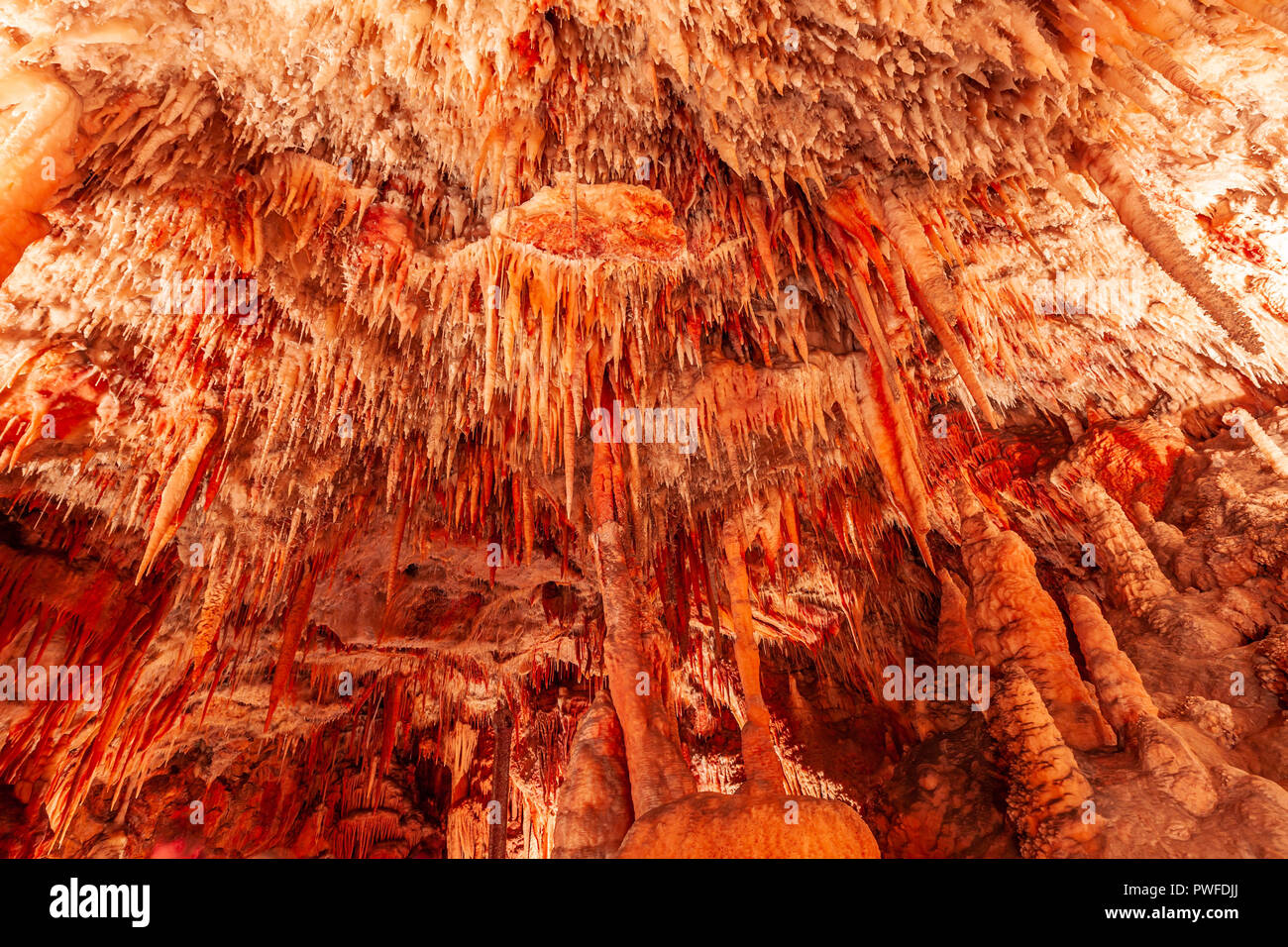 Huge Limestone Cave Ceiling With Stalactites Hanging Down
