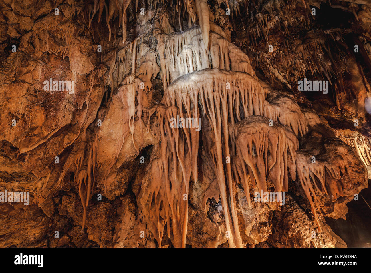 Intricate geologic formations in a cave Stock Photo