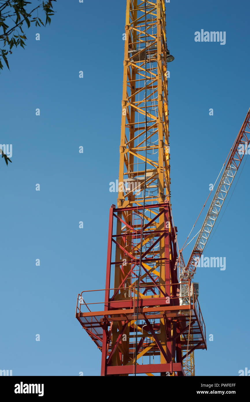 a new crane, colorful, against blue clear sky Stock Photo