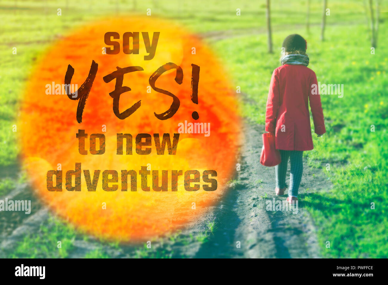 say yes to new adventures slogan printed over image with little girl going away Stock Photo