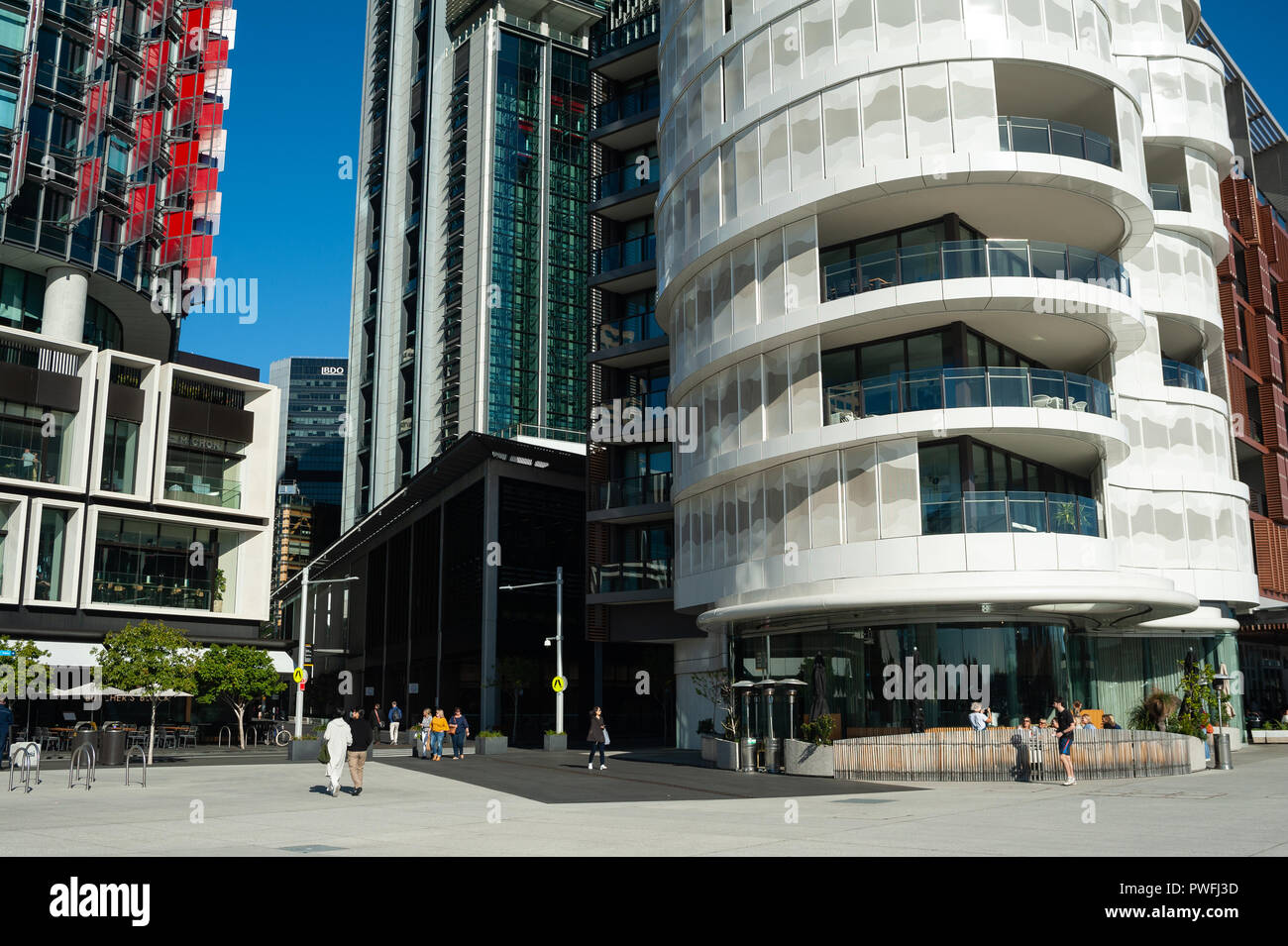 16.09.2018, Sydney, New South Wales, Australia - A view of modern residential buildings of the Anadara Residence, office towers and restaurants. Stock Photo