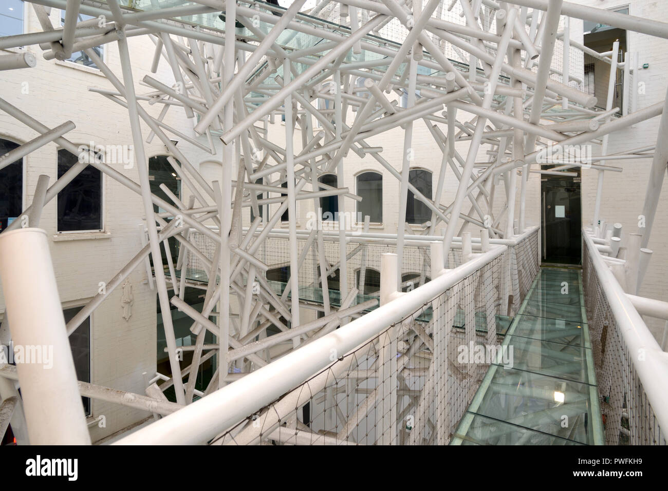 Glass & Steel or Metal Walkway & Tubular Sculpture in Courtyard of Office Building at the