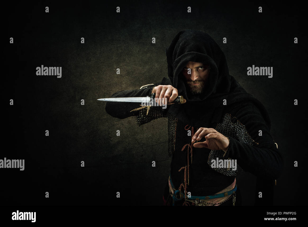Portrait of a knight in armor, long hair Stock Photo - Alamy