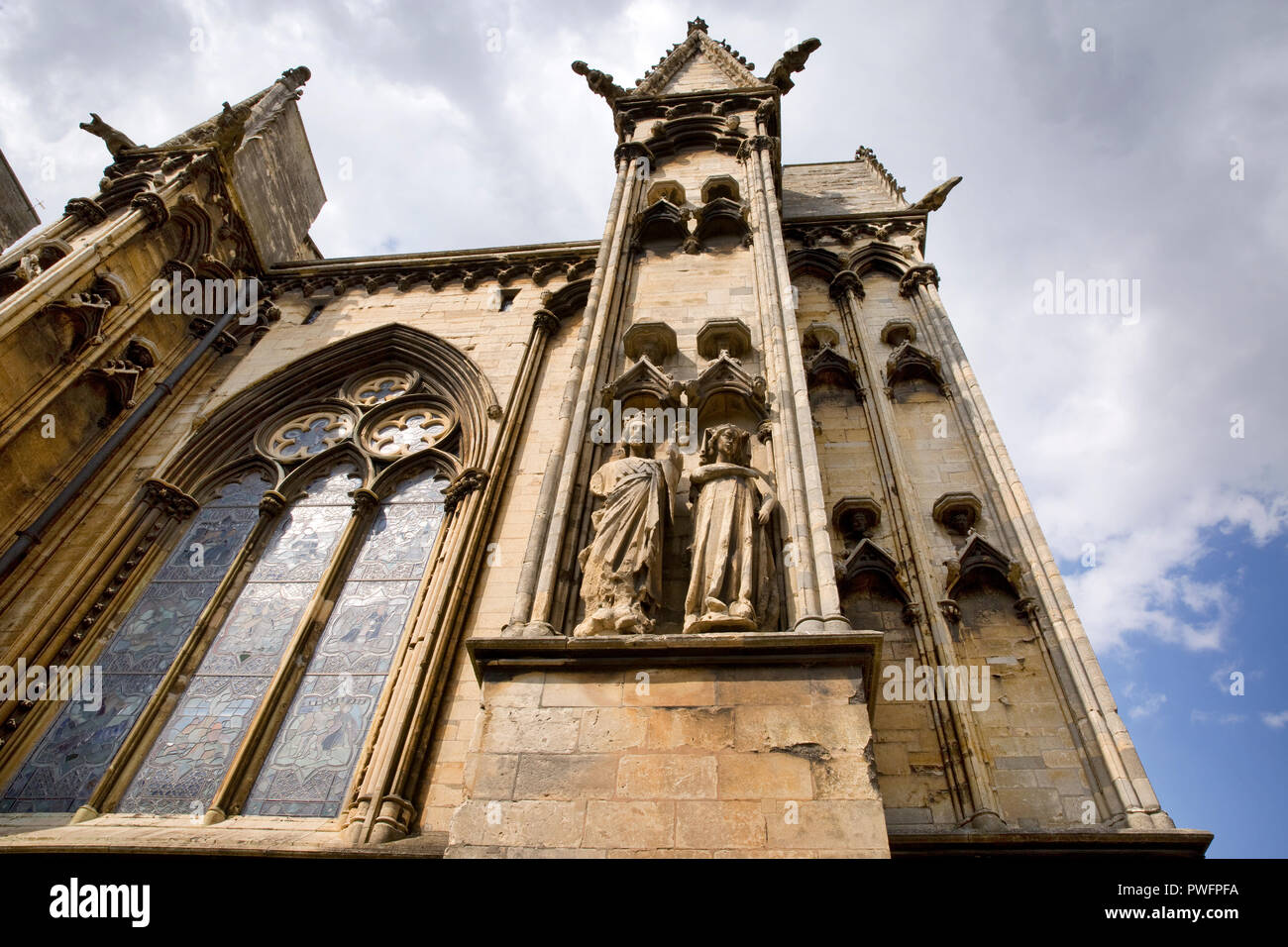 Carved figures, exterior Lincoln Cathedral. City of Lincoln, England, United Kingdom Stock Photo