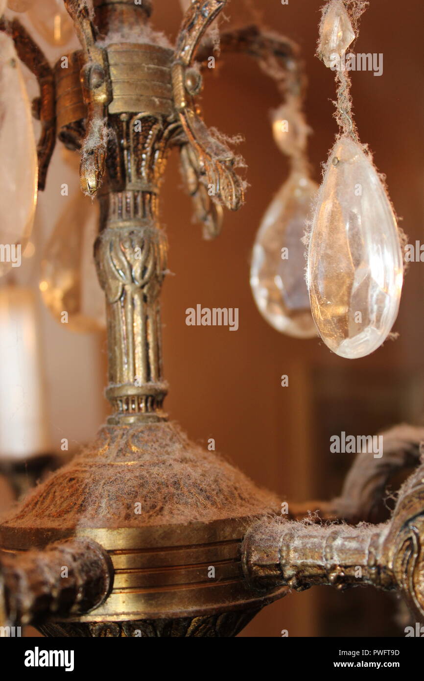 Dusty and vintage chandelier candelabra. Stock Photo