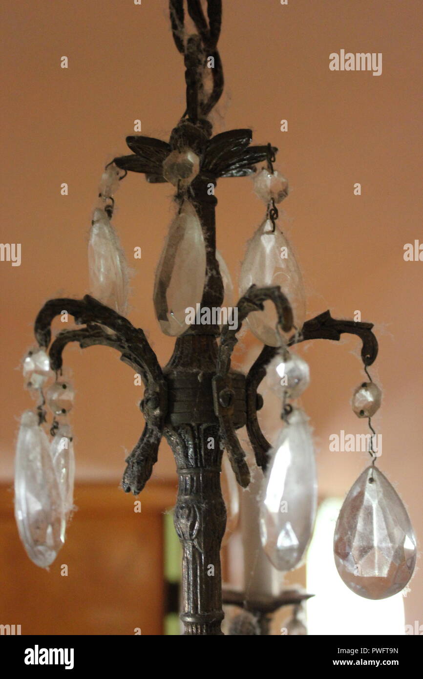 Dusty and vintage chandelier candelabra. Stock Photo