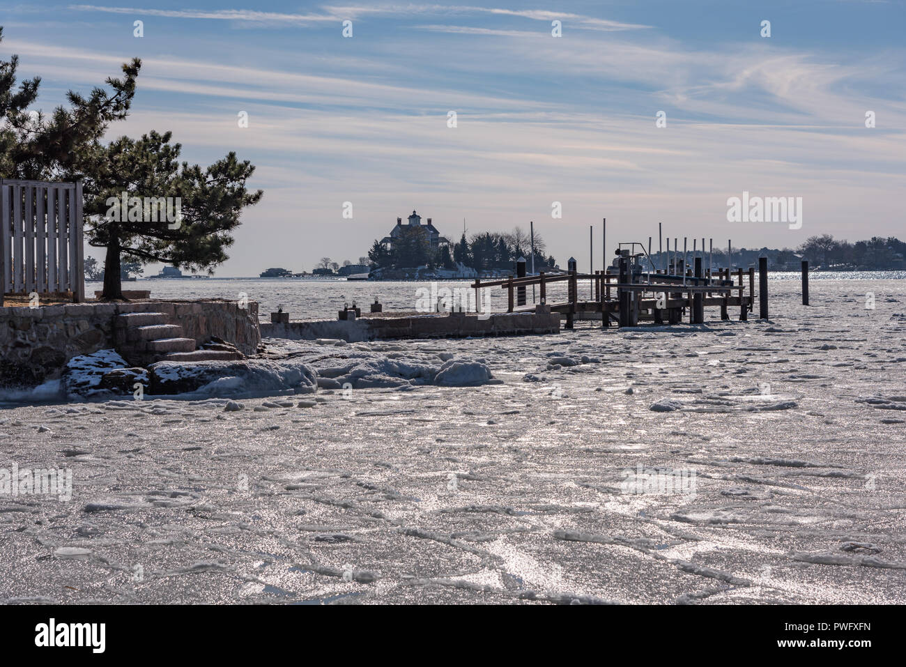 Sea ice around harbor in new england winter Stock Photo