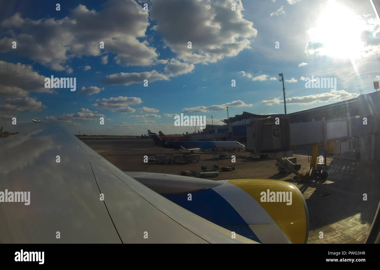 Parked aircraft on airport through the airplane window Stock Photo - Alamy