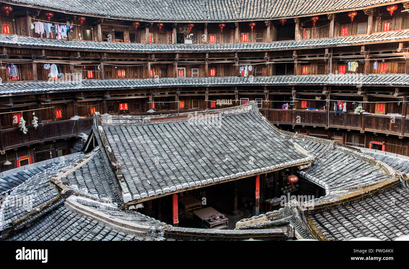 The Zhencheng Building, a 4-storey tulou. Tulou are fortified, adobe (earth) Hakka clan houses, in Fujian Province in southern China. Stock Photo