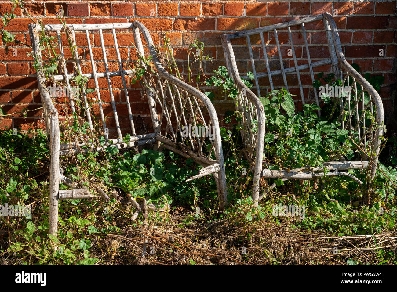 Damaged wooden garden furniture Stock Photo Alamy