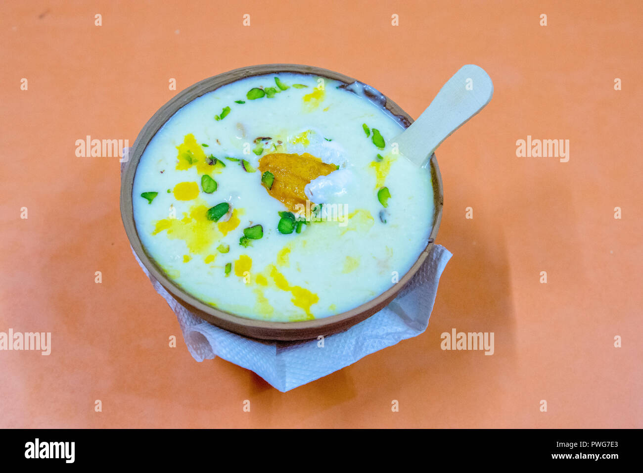 Lassi a traditional dahi (yogurt) based drink that originated in India. Lassi is a blend of yogurt, water, spices and sometimes fruit. Stock Photo
