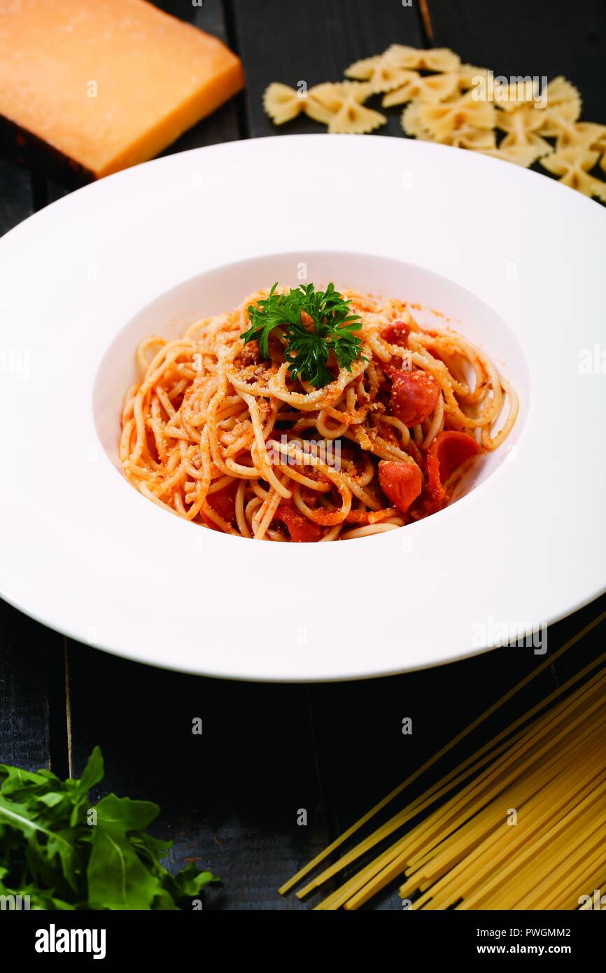 Sausage meat sauce noodles Stock Photo Alamy
