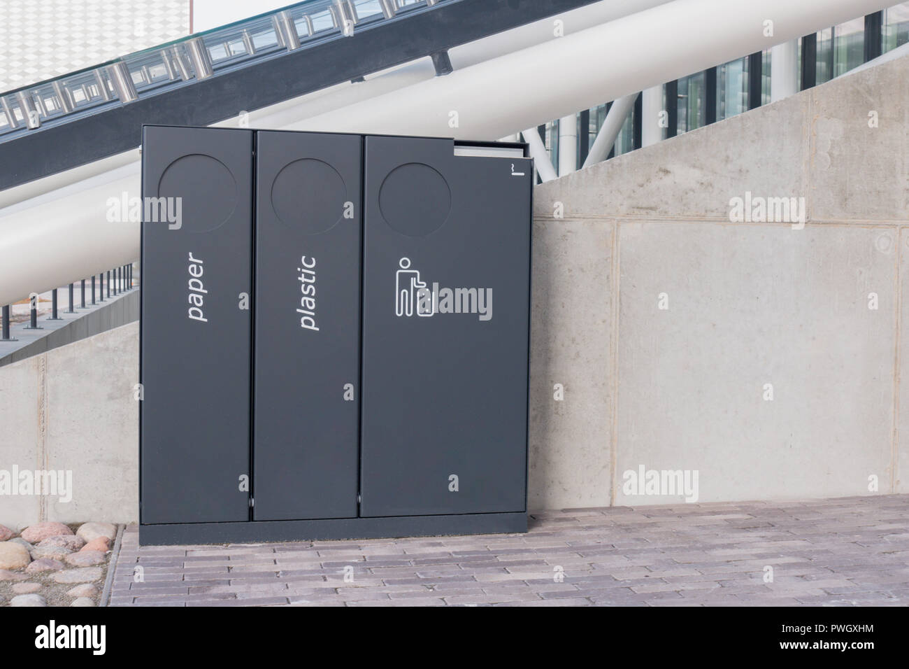 Recycling and garbage bins near office building outdoor Stock Photo Alamy