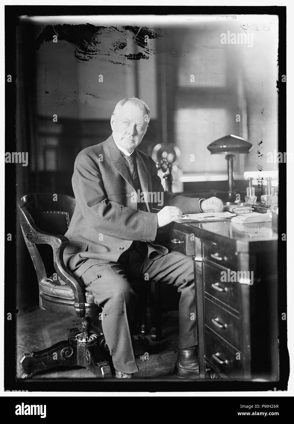 BURLESON, ALBERT SIDNEY. REP. FROM TEXAS, 1899-1913; POSTMASTER GENERAL, 1913-1921. AT DESK, POST OFFICE DEPARTMENT Stock Photo