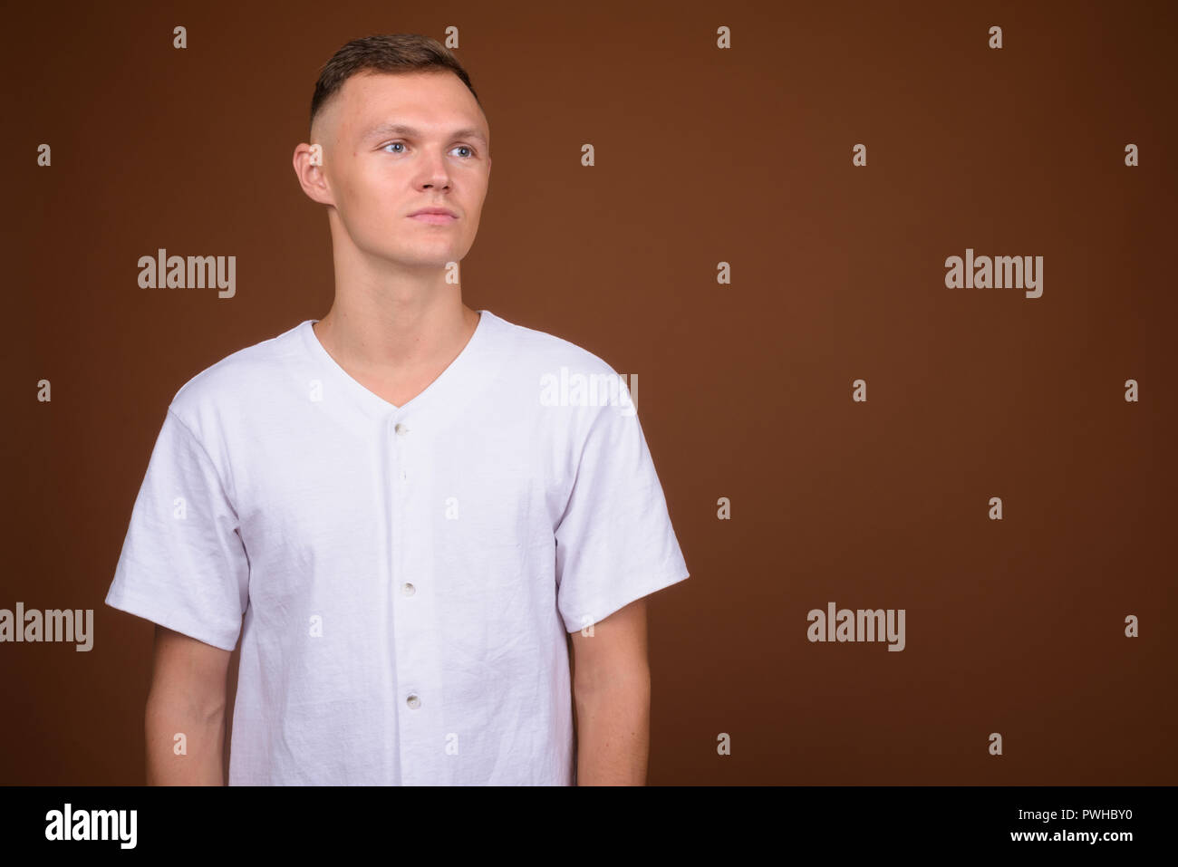 Man wearing white shirt hi-res stock photography and images - Alamy