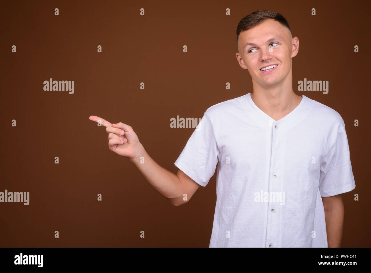 Man wearing white shirt finger hi-res stock photography and images - Alamy