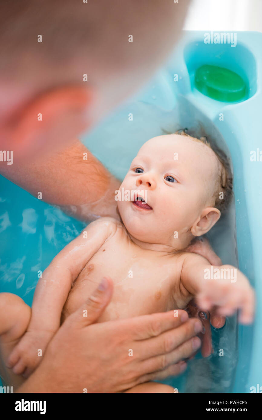 giving bath to baby