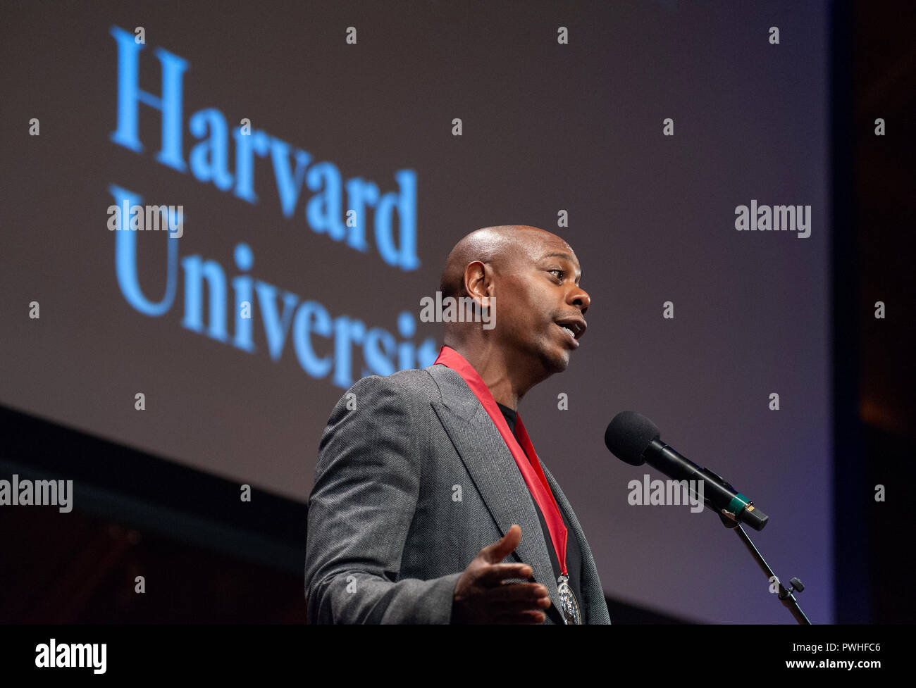 10/11/2018: Hutchins Center, Harvard University, Cambridge, MA. Actor and Comedian Dave Chappelle speaking after receiving a W.E.B. Du Bois medal.  Chappelle was one of eight African Americans to receive the medal for their contribution to African and African American history and culture at Harvard University in Cambridge, Massachusetts, USA. The W.E.B. Du Bois medals have been awarded yearly since 2013 to those who have made significant contributions to African and African American history and culture. Stock Photo