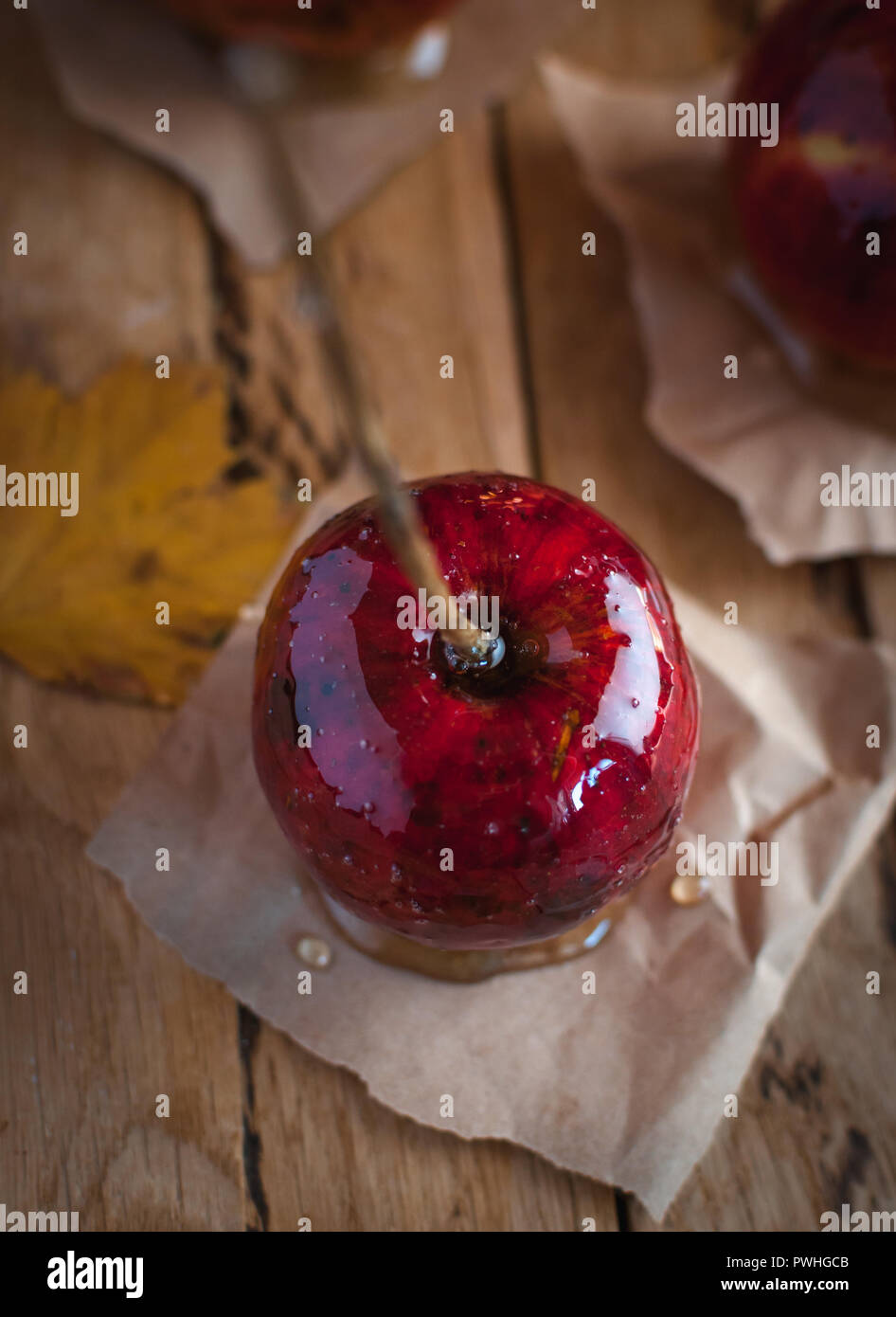 Candy apple on wooden background, top view Stock Photo