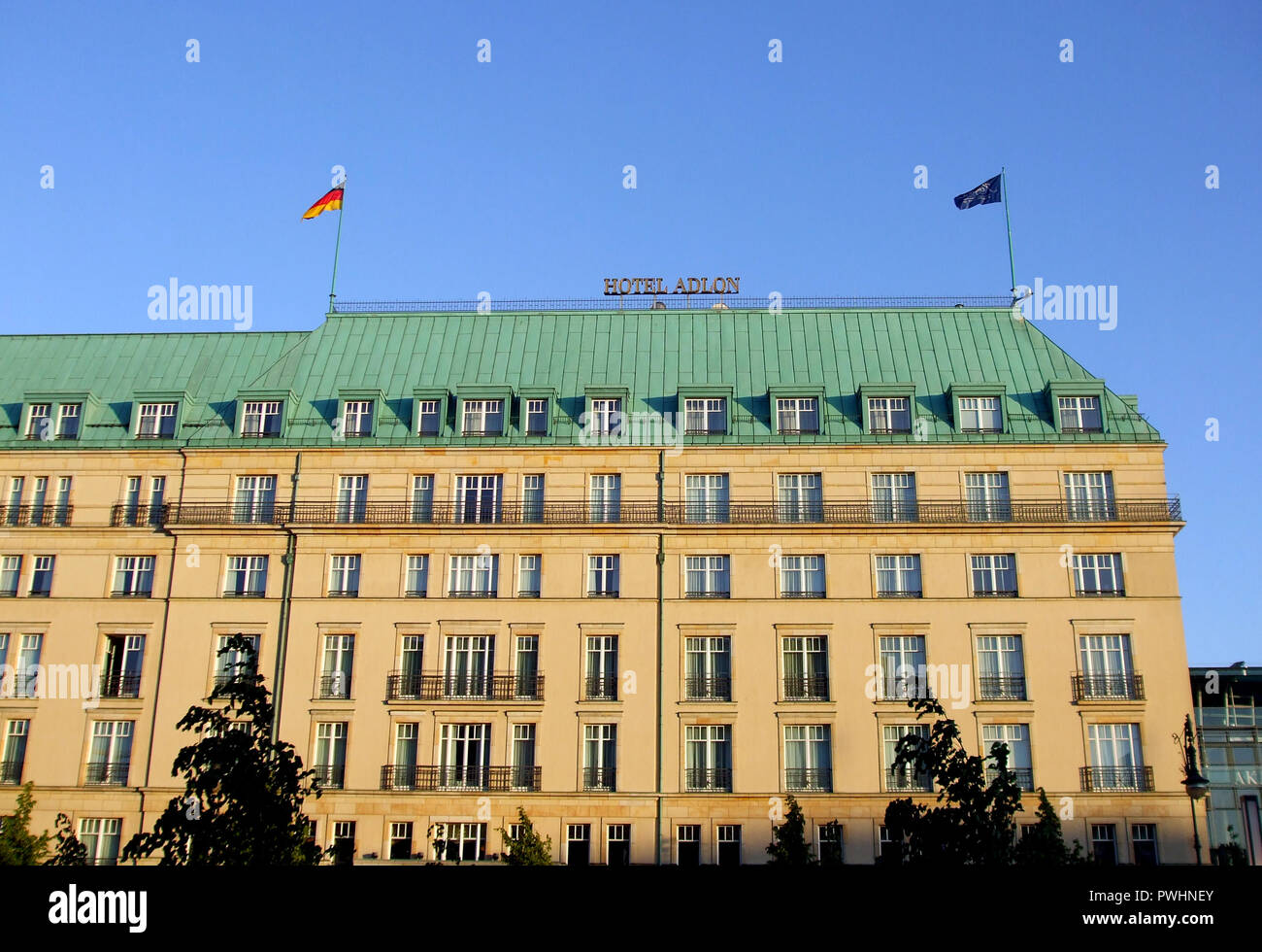 The huge, famous, 5 star Adlon Hotel sits alongside the Brandenburg Gate monument in the German city of Berlin. Stock Photo