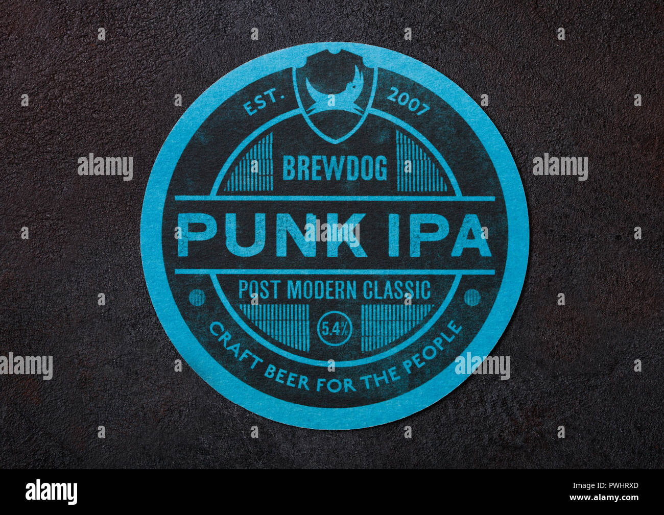 LONDON, UK - AUGUST 22, 2018: Brew Dog Punk Ipa paper beer beermat coaster on black background. Stock Photo