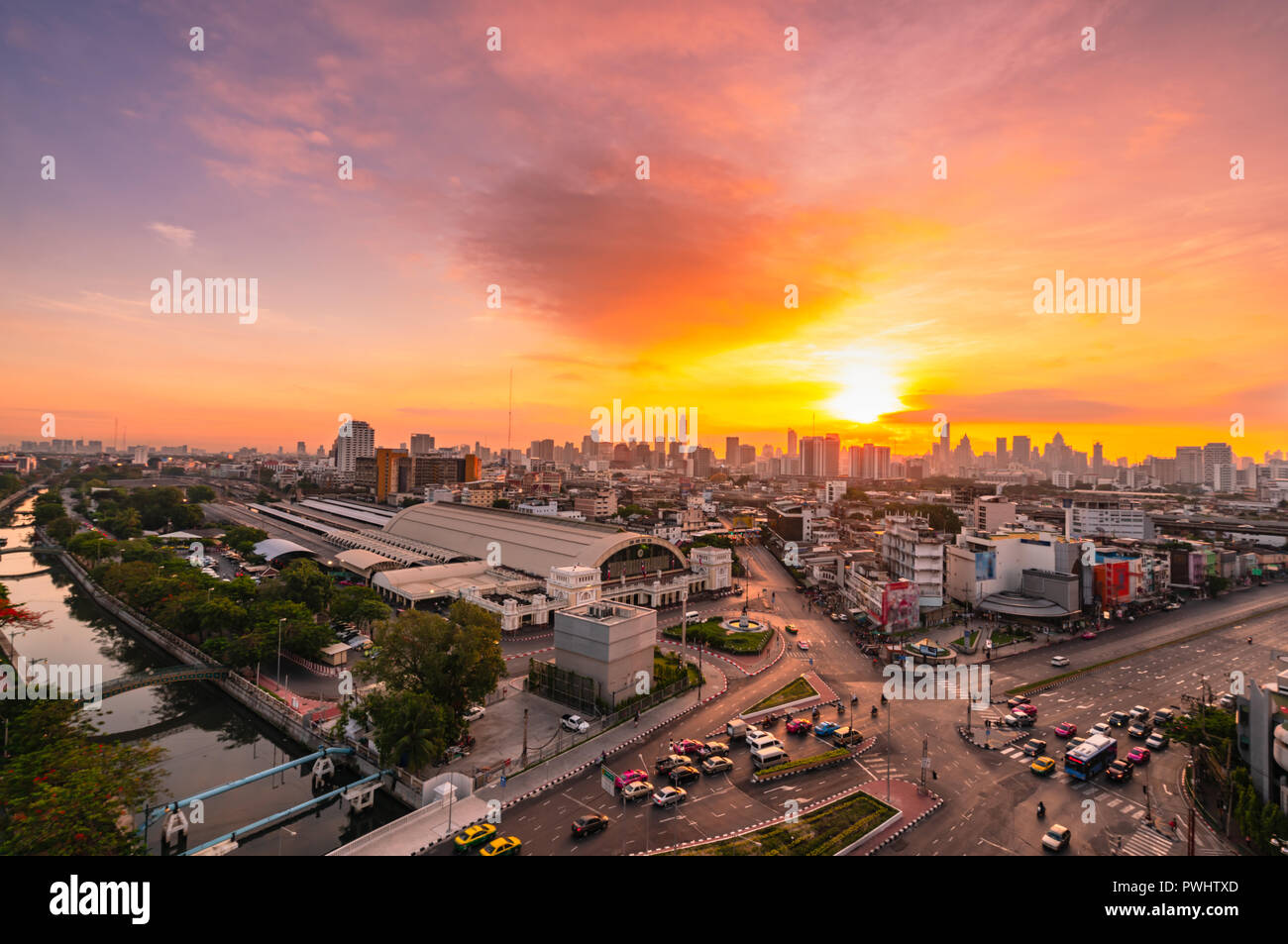 Aerial view of Bangkok cityscape with bangkok railway station at sunset Stock Photo