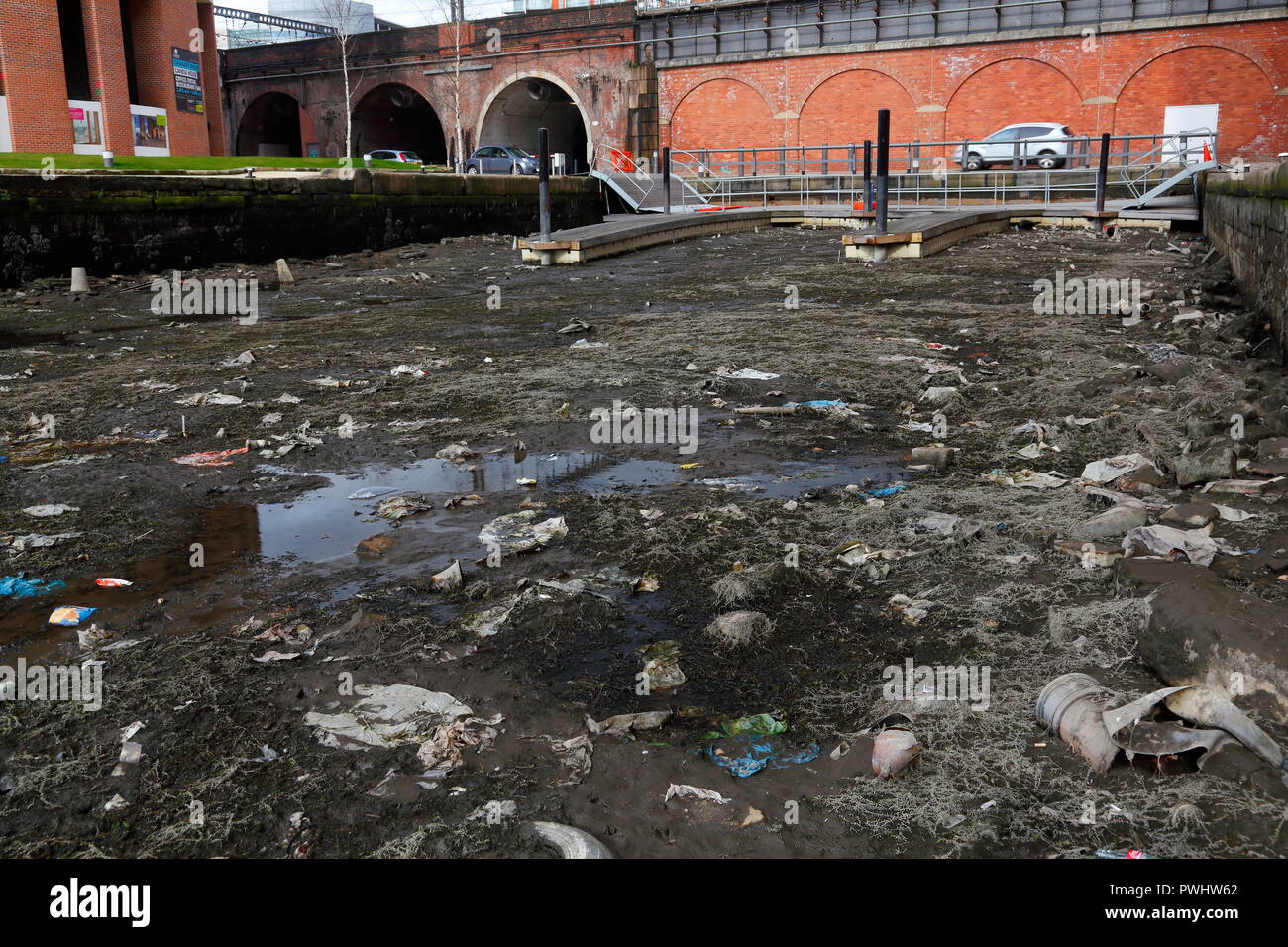 The Leeds to Liverpool Canal in Leeds which was drained to allow work to be carried out to one of the Locks at Granary Wharf in Leeds City Centre. Stock Photo