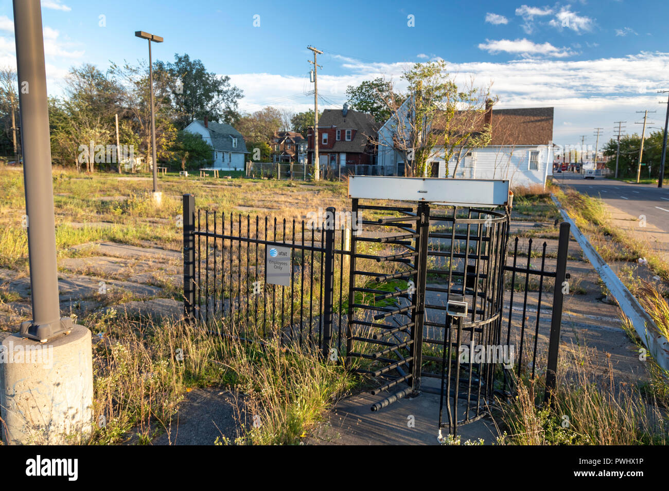 Detroit, Michigan - A turnstile is all that remains on an abandoned AT&T employee parking lot. Stock Photo