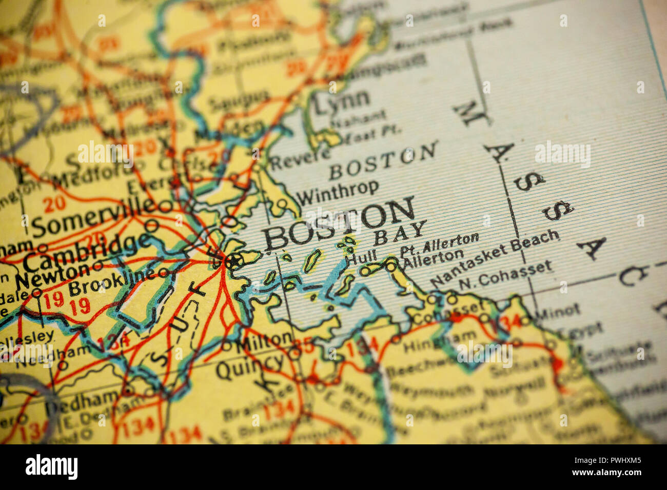 Boston, Massachusetts is the center of focus on an old map. Stock Photo