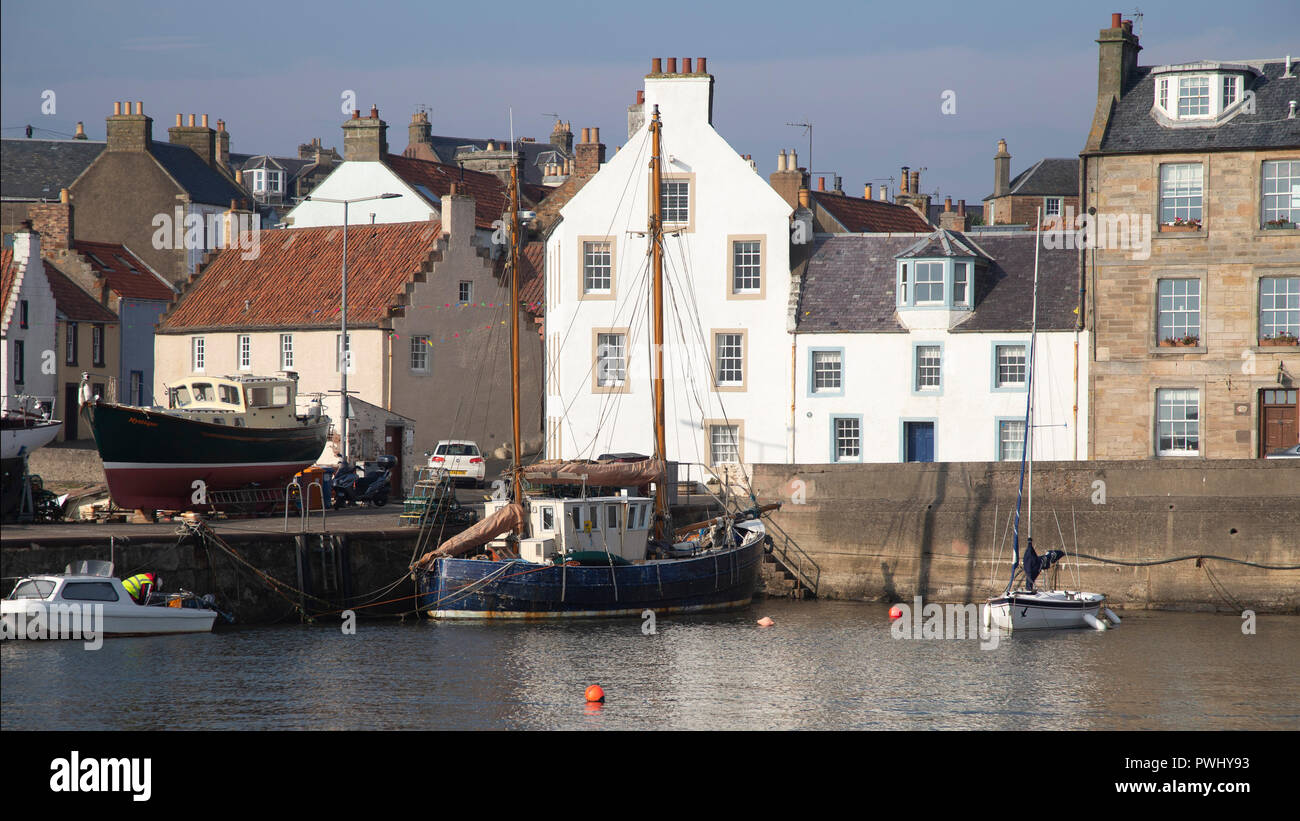 Fishing boats in the harbour at St Monans, Fife, Scotland Stock Photo