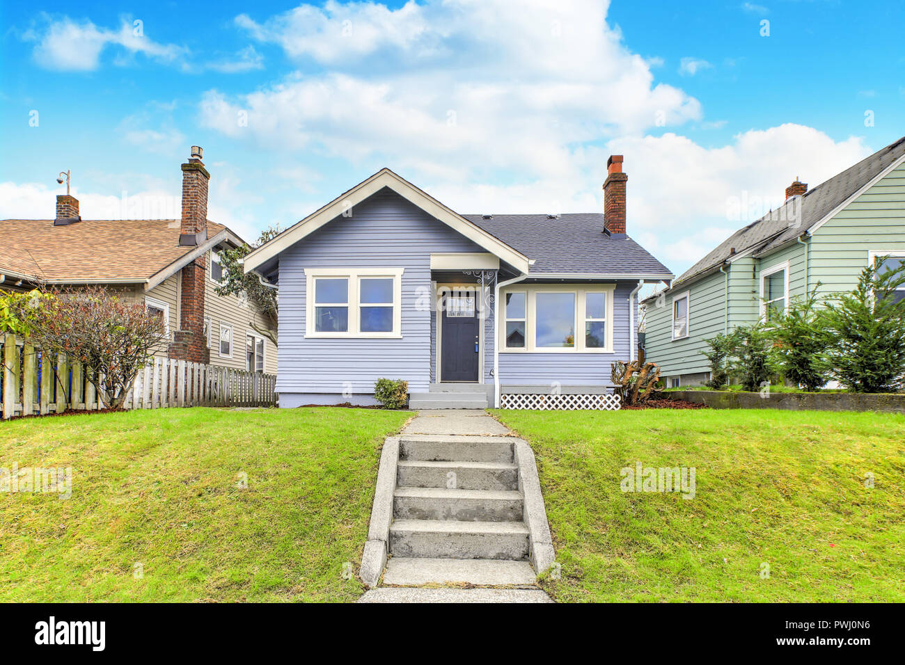 Picture of Home exterior with blue siding Stock Photo - Alamy