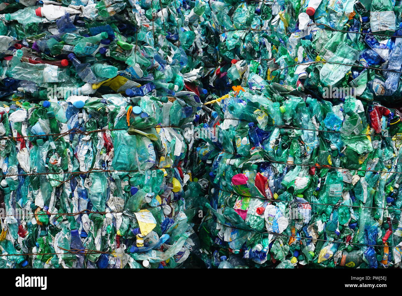 Colorful recycled plastic bottles crushed into a pile for transport in France Stock Photo Alamy