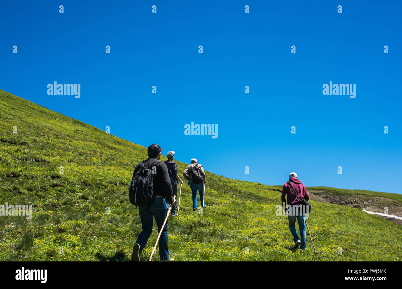 Boy traveler trekking poles hi-res stock photography and images - Alamy