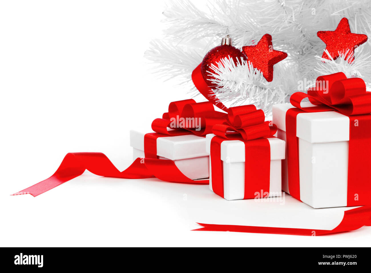 White christmas tree and presents isolated on white background Stock ...