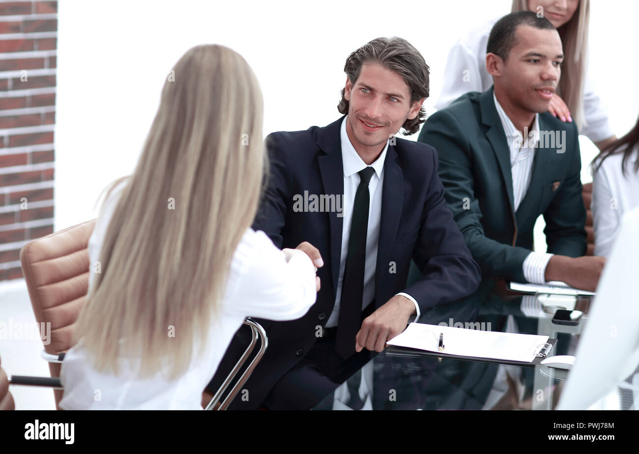 handshake business people at the negotiating table Stock Photo - Alamy