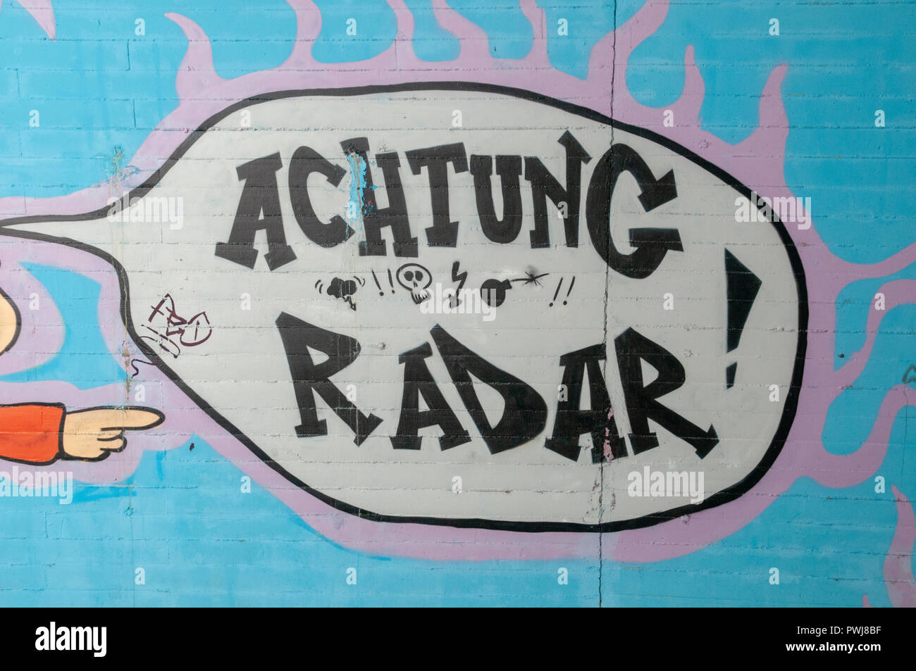 Achtung Radar, Graffiti on a wall in an underpass. Photographed on the Inn River cycling path, Tyrol, Austria Stock Photo