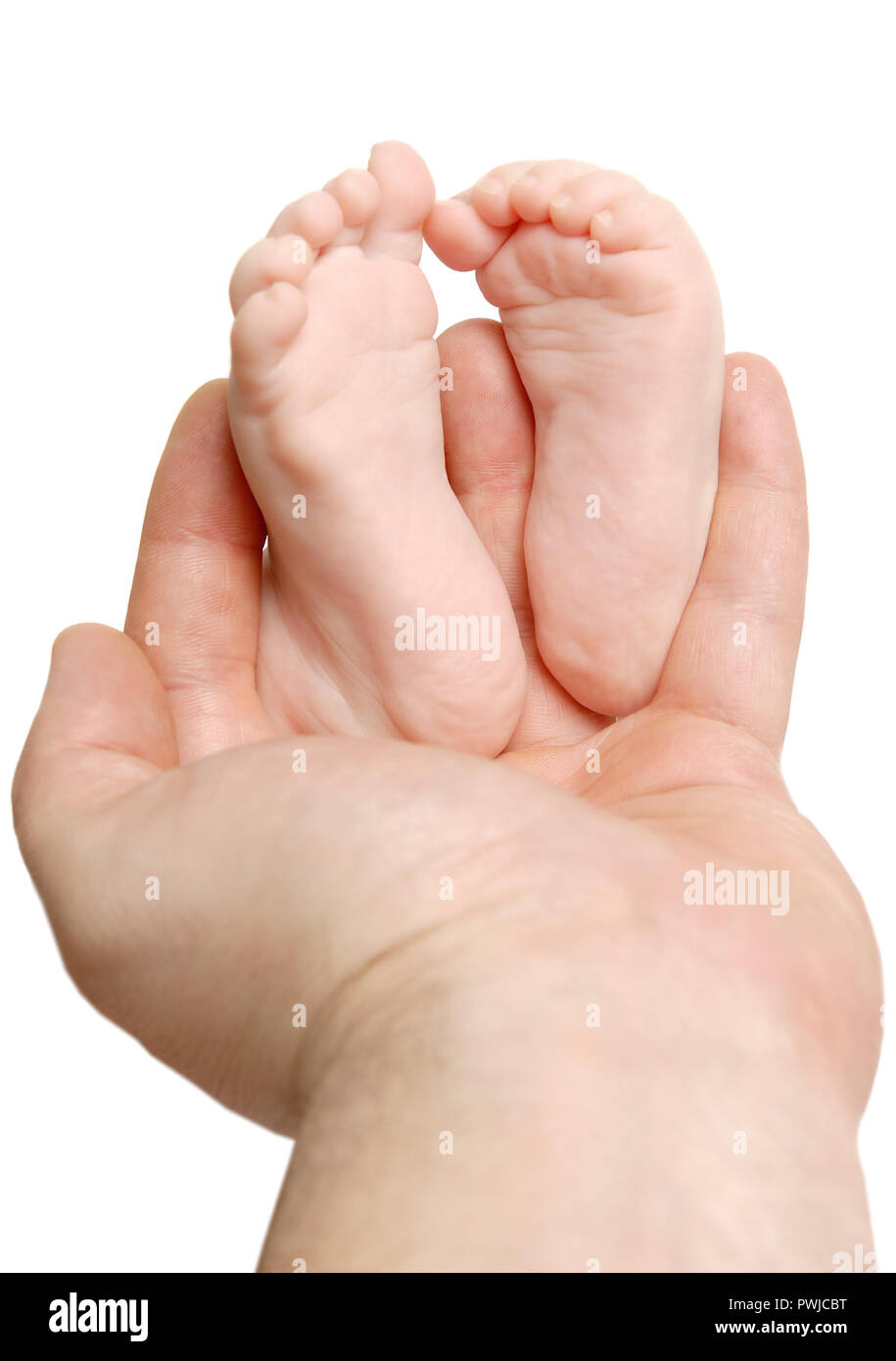 https://c8.alamy.com/comp/PWJCBT/mens-palm-holding-a-small-babys-feet-PWJCBT.jpg