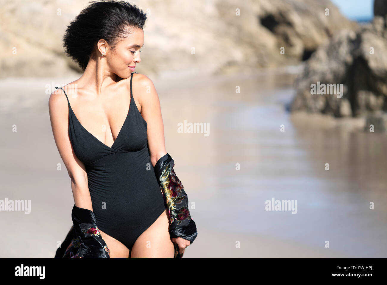 Young female  model on beach Stock Photo