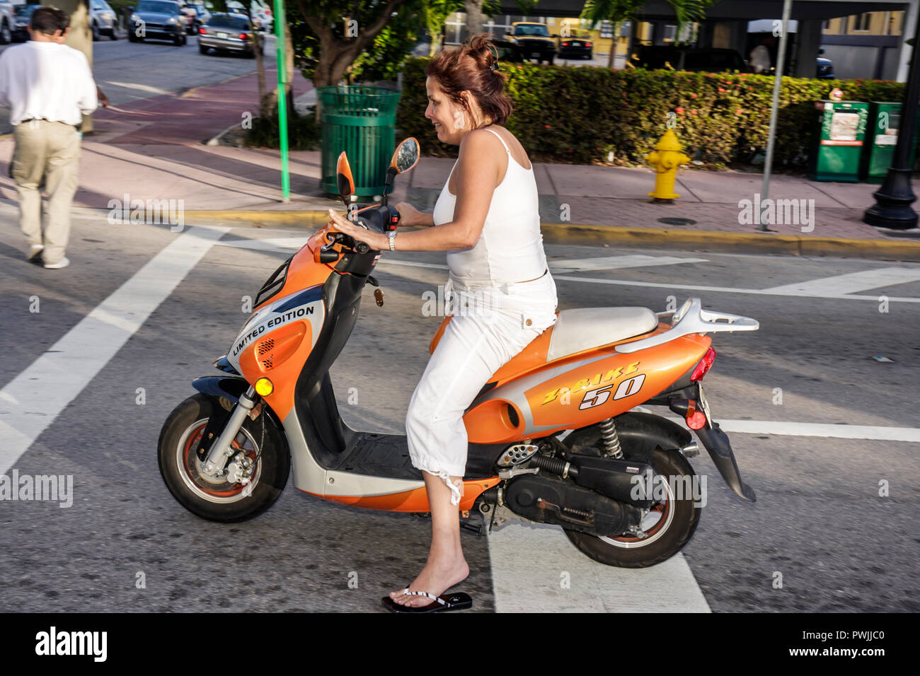 Tourist group on two wheel scooters hires stock photography and images