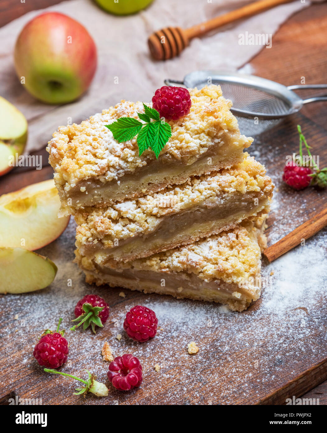 stack of square pieces of baked apple pie, top view,  crumble cake Stock Photo