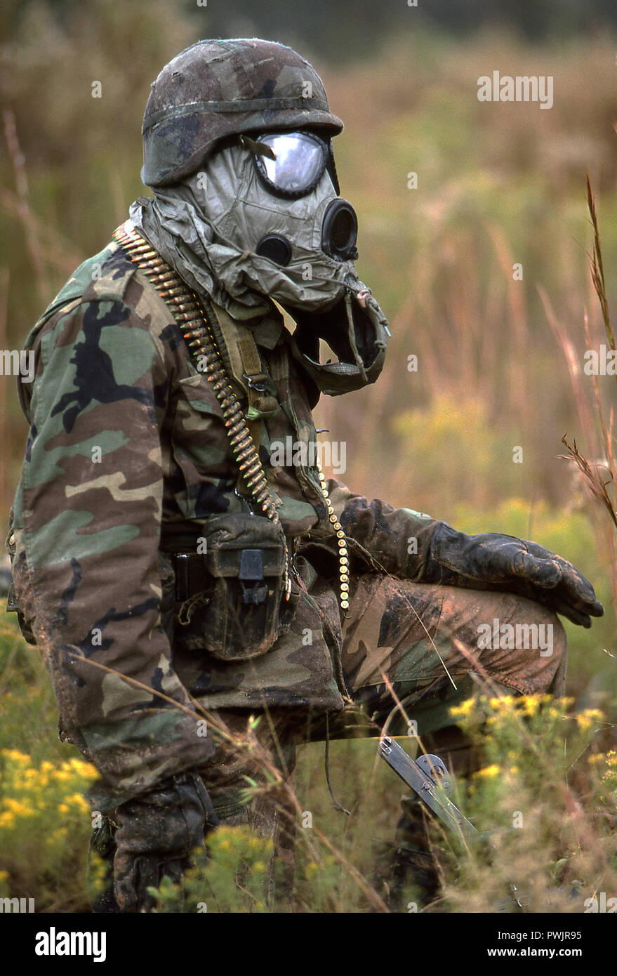 Soldier in gas mask, Combat protection Stock Photo