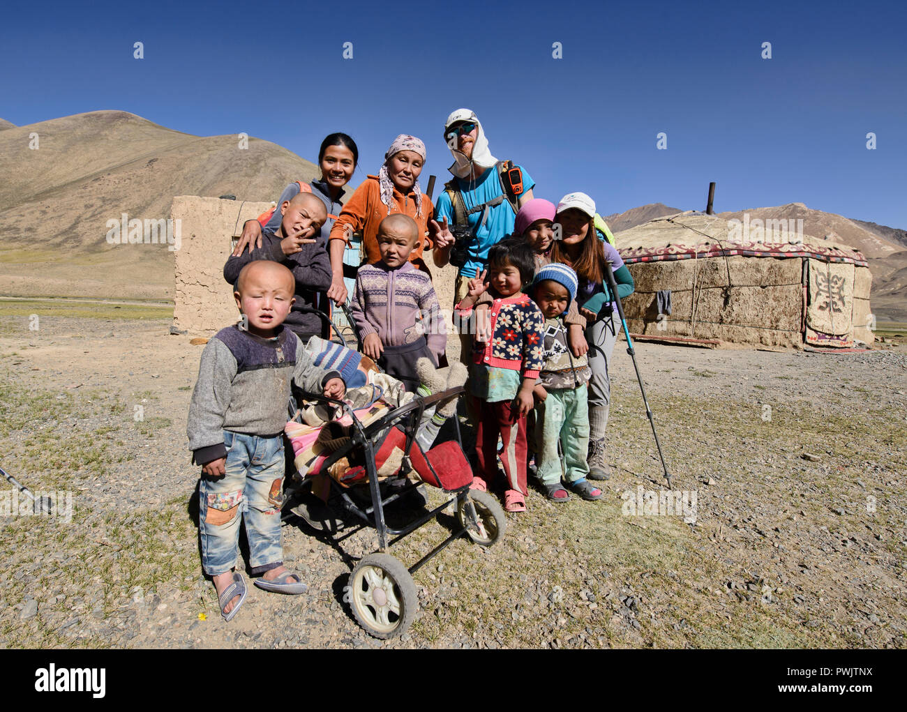 Tourists at Kyrgyz yurt camp, Pshart Valley, Tajikistan Stock Photo