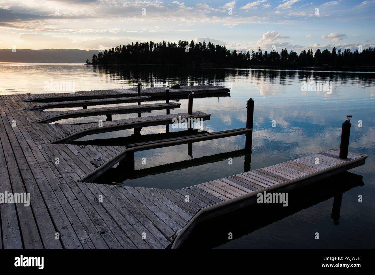 Empty boat slips at sunset at Flathead Lake, Montana Stock Photo