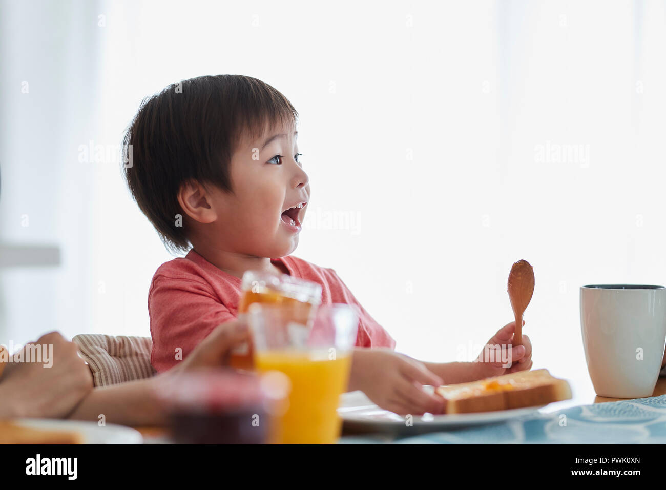 Japanese kid having breakfast Stock Photo - Alamy