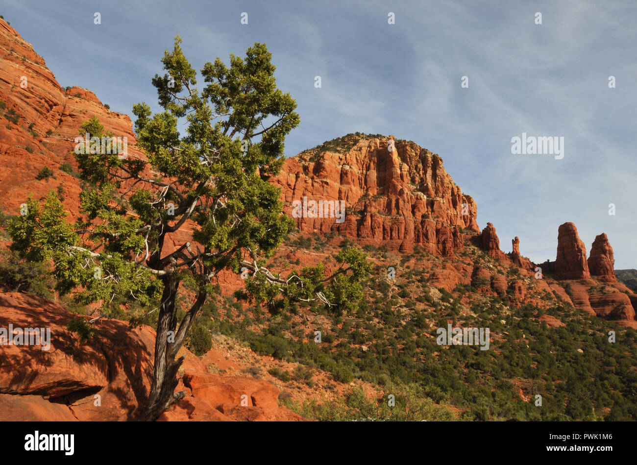 Landscape image showing some of the dramatic red rock formations in Sedona, Arizona, including those called Madonna and Child and the Two Nuns. Stock Photo