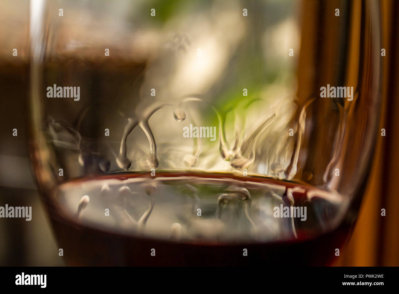 Red Wine Leg in a glass Stock Photo Alamy