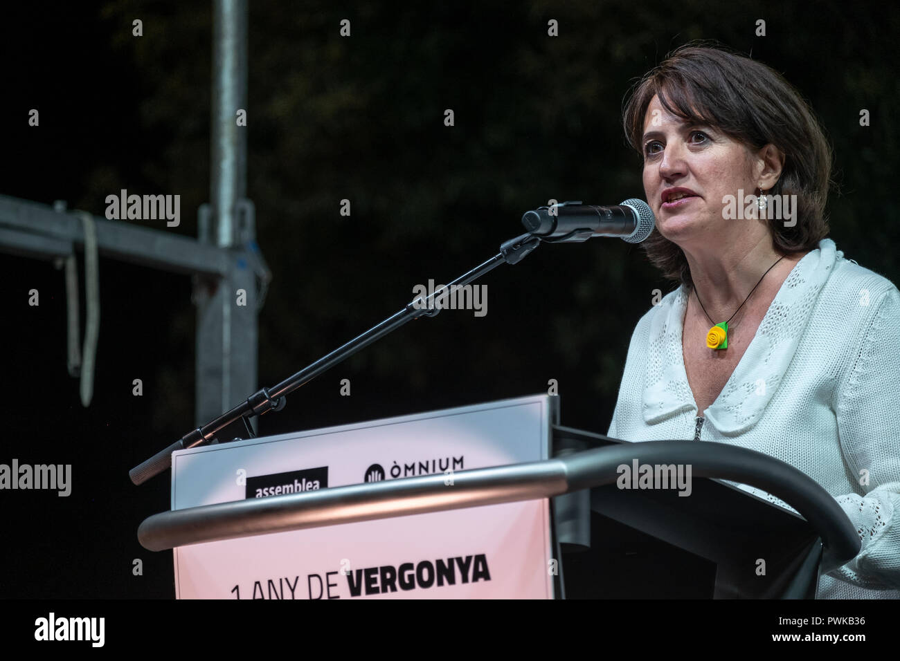 Elisenda Paluzie, President of ANC seen speaking during the protest. Thousands of people protest demanding for the freedom of Jordi Cuixart and Jordi Sànchez, "los Jordis" after 1 year in prison, under the motto a year of shame, a year of dignity, they will not stop us. Stock Photo