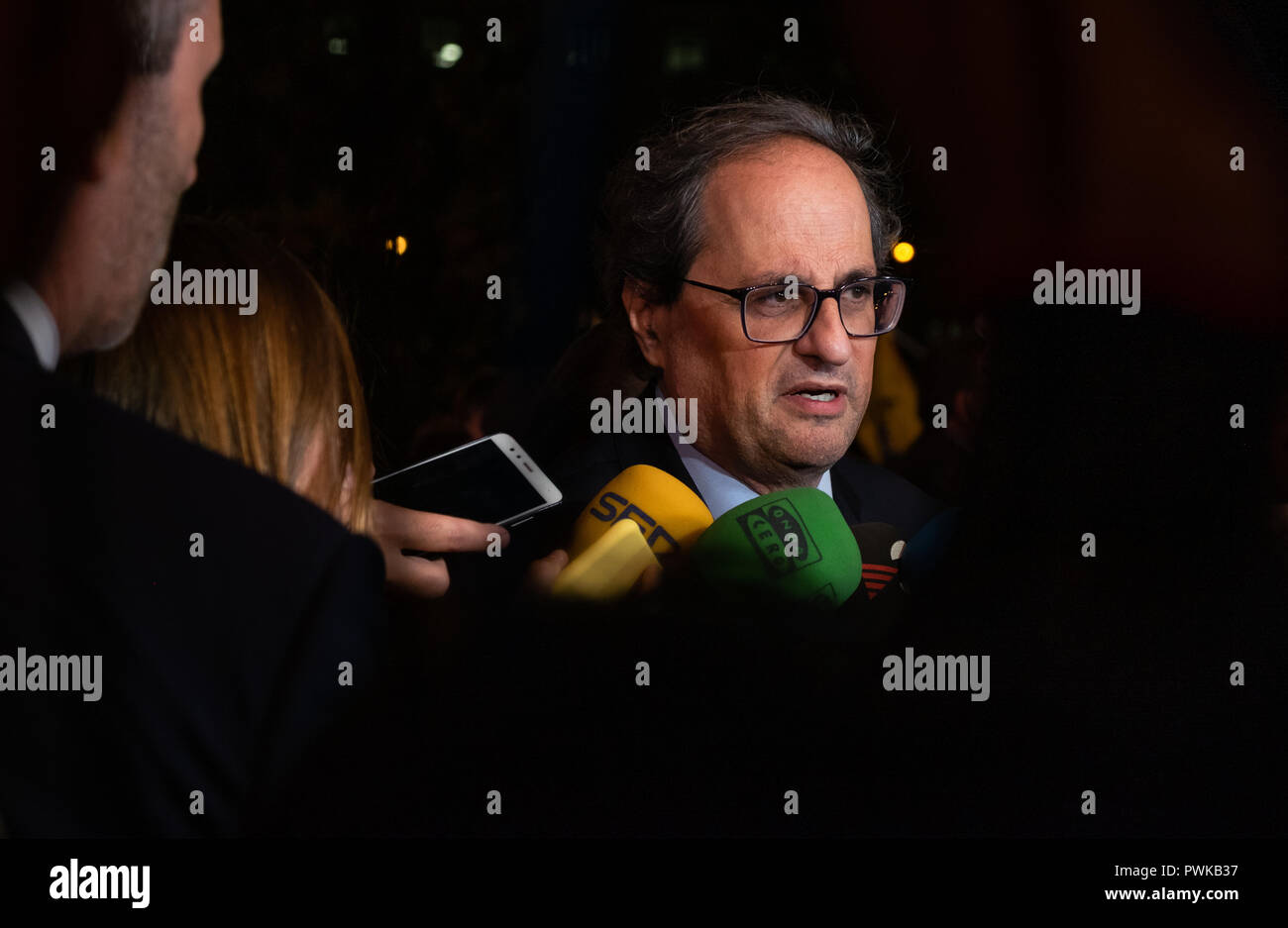 The President of the Generalitat of Catalonia, Quim Torra seen speaking the media during the protest. Thousands of people protest demanding for the freedom of Jordi Cuixart and Jordi Sànchez, 'los Jordis' after 1 year in prison, under the motto a year of shame, a year of dignity, they will not stop us. Stock Photo
