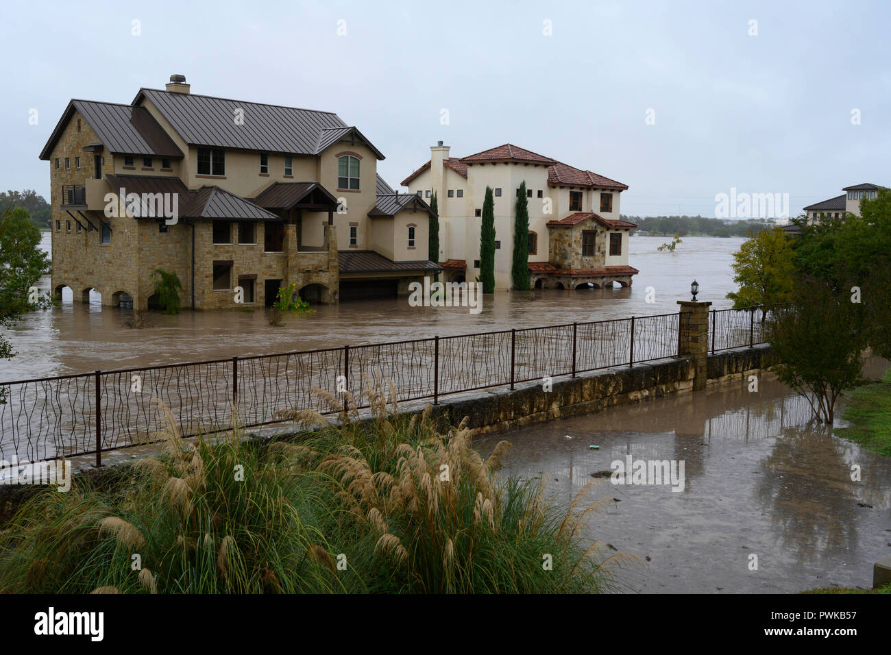 Heavy rains in the Texas Hill Country cause flooding on Lake LBJ, with mud- and debris-filled ...