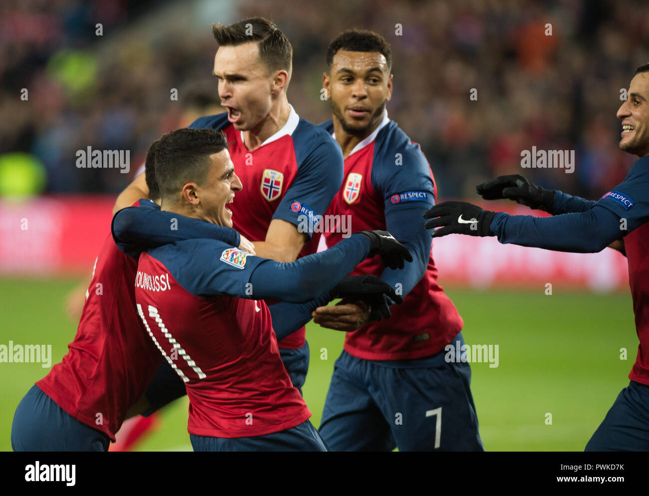 Oslo, Norway. 16th Oct, 2018. Mohamed Elyounoussi (11) of Norway scores for 1-0 and is surrounded by team mates during the UEFA Nations League football match between Norway and Bulgaria at Ullevaal Stadion. (Photo credit: Gonzales Photo - Jan-Erik Eriksen). Credit: Gonzales Photo/Alamy Live News Stock Photo
